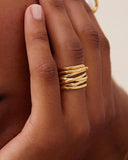 Gold plated multi-band open ring with textured organic lines and bold sculptural design, creating a modern statement look — επιχρυσωμένο δαχτυλίδι με πολλαπλές οργανικές γραμμές και ανοιχτή ρυθμιζόμενη γραμμή, που δημιουργεί ένα μοντέρνο statement κόσμημα με minimal αισθητική. Διαθέσιμο στο Iconic Angels Glyfada.