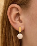Gold plated drop earrings with natural pearl pendant and minimal rectangular stud, blending timeless elegance with modern simplicity — επιχρυσωμένα σκουλαρίκια με φυσικό μαργαριτάρι και minimal ορθογώνιο στοιχείο, που συνδυάζουν διαχρονική κομψότητα και σύγχρονο minimal στυλ. Διαθέσιμα στο Iconic Angels Glyfada.
