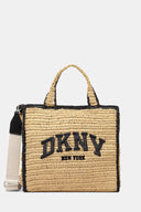 Woven raffia DKNY tote in natural beige with black details and bold logo, spacious and structured with dual handles and shoulder strap — ψάθινη DKNY τσάντα σε φυσική απόχρωση με μαύρες λεπτομέρειες και λογότυπο, ευρύχωρη και κομψή, ιδανική για summer city looks και resort styling με minimal χαρακτήρα. Διαθέσιμη στο Iconic Angels Glyfada.
