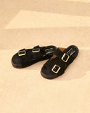Suede Nordic sandals in classic black with satin gold buckles and a natural jute footbed, combining timeless elegance with everyday comfort — μαύρα suede Nordic σανδάλια με σατινέ χρυσές αγκράφες και φυσικό πάτο από σχοινί, ιδανικά για effortless chic εμφανίσεις που φοριούνται από το πρωί έως το βράδυ. Διαθέσιμα στο Iconic Angels Glyfada.