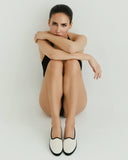 Canvas two-tone ballet flats in natural beige with black trim, minimal and timeless, perfect for effortless summer styling — υφασμάτινες μπαλαρίνες σε φυσική μπεζ απόχρωση με μαύρο τελείωμα, κομψές και ανάλαφρες, ιδανικές για minimal chic εμφανίσεις από το πρωί έως το βράδυ. Διαθέσιμες στο Iconic Angels Glyfada.