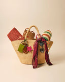 Handwoven starfish keychain in raffia with playful character and summery feel, the perfect little accessory to elevate your everyday essentials — πλεκτό μπρελόκ αστερίας από raffia με παιχνιδιάρικο design και καλοκαιρινή διάθεση, ιδανικό για να δώσει χαρακτήρα στα κλειδιά ή την τσάντα σας. Διαθέσιμο στο Iconic Angels Glyfada.