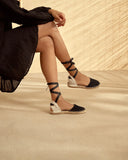 Women’s black suede flat espadrille sandals with ankle wrap ties, γυναικεία flat εσπαντρίγια από suede δέρμα σε μαύρο χρώμα με κορδέλες που δένουν στον αστράγαλο και σχοινένια σόλα, κομψή καλοκαιρινή επιλογή, από το Iconic Angels Glyfada.