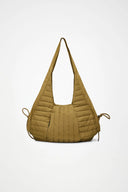 Quilted khaki shoulder bag with sculptural silhouette, ultra-light and statement-making, designed for effortless day-to-night styling — καπιτονέ χακί shoulder bag με ιδιαίτερη γραμμή, ανάλαφρη αλλά εντυπωσιακή, ιδανική για μοντέρνα looks από το πρωί έως το βράδυ. Διαθέσιμη στο Iconic Angels Glyfada.