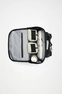 Cargo-style green backpack with bold RAINS logo, multiple zip compartments and structured silhouette, functional and modern for everyday use or travel — πράσινο backpack cargo με έντονο λογότυπο RAINS, πολλαπλές θήκες με φερμουάρ και δομημένο σχήμα, πρακτικό και σύγχρονο για καθημερινές εμφανίσεις ή ταξίδια. Διαθέσιμο στο Iconic Angels Glyfada.