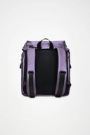 Waterproof purple backpack with soft matte finish and sleek flap closure, minimal yet statement for city styling — αδιάβροχο μωβ backpack με απαλή ματ υφή και κομψό καπάκι με μεταλλικό κούμπωμα, ιδανικό για καθημερινά looks με fashion χαρακτήρα και πρακτική άνεση. Διαθέσιμο στο Iconic Angels Glyfada.
