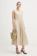 Beige sleeveless midi dress with clean round neckline, fitted waist and flared skirt with side pockets, combining minimal elegance with effortless structure — μπεζ αμάνικο midi φόρεμα με καθαρή λαιμόκοψη, τονισμένη μέση και άνετη φούστα με τσέπες, ιδανικό για office chic και refined day looks. Διαθέσιμο στο Iconic Angels Glyfada.