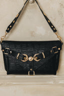 Individual Art Leather Messy μαύρη τσάντα ώμου από croco ανάγλυφο δέρμα με διακοσμητικά straps, μεταλλικές αγκράφες και statement hardware, ιδανική για edgy και sophisticated καθημερινά looks.