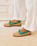 Manebi women’s beige suede boat shoes with green bandana print detail and classic lace-up design, combining nautical inspiration with relaxed Mediterranean summer style for elegant casual outfits — γυναικεία μπεζ suede boat shoes Manebi με πράσινη bandana λεπτομέρεια και κορδόνια, εμπνευσμένα από nautical αισθητική για κομψά καλοκαιρινά casual looks. Διαθέσιμα στο Iconic Angels Glyfada.