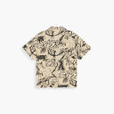 OAS beige short sleeve shirt with black illustrated graphic pattern and camp collar, featuring a relaxed fit and textured fabric for statement summer styling — μπεζ κοντομάνικο πουκάμισο OAS με μαύρο illustrated graphic σχέδιο και camp γιακά, με χαλαρή γραμμή και textured ύφασμα για statement καλοκαιρινά looks.