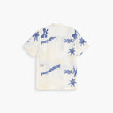 OAS white short sleeve shirt with blue abstract jacquard pattern and camp collar, featuring a relaxed fit and lightweight fabric for summer resort styling — λευκό κοντομάνικο πουκάμισο OAS με μπλε abstract jacquard σχέδιο και camp γιακά, με χαλαρή γραμμή και ελαφρύ ύφασμα για καλοκαιρινά resort looks.