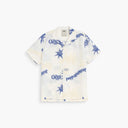 OAS white short sleeve shirt with blue abstract jacquard pattern and camp collar, featuring a relaxed fit and lightweight fabric for summer resort styling — λευκό κοντομάνικο πουκάμισο OAS με μπλε abstract jacquard σχέδιο και camp γιακά, με χαλαρή γραμμή και ελαφρύ ύφασμα για καλοκαιρινά resort looks.