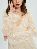Project Soma cream mini dress with textured fringe and sequin detailing, featuring a deep V-neckline, long sleeves and fitted silhouette for statement evening and party looks — γυναικείο Project Soma κρεμ mini φόρεμα με κρόσσια και παγιέτες, βαθύ ντεκολτέ και μακριά μανίκια, ιδανικό για εντυπωσιακές βραδινές εμφανίσεις.