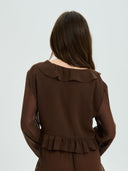 Project Soma brown sheer ruffle crop top with lightweight chiffon fabric and cascading frill detailing, featuring a deep V neckline, tie-front closure and flared sleeves for bold coordinated and evening looks — γυναικείο Project Soma καφέ διάφανο crop top με βολάν και chiffon υφή, με βαθύ ντεκολτέ, δέσιμο μπροστά και καμπάνα μανίκια για εντυπωσιακά σύνολα.
