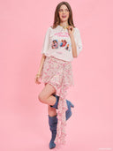 White oversized graphic T-shirt from Project Soma x Barbie collection with “Makin’ Things Happen” print and Barbie imagery for playful statement styling — λευκό oversized γυναικείο t-shirt Project Soma x Barbie με graphic print “Makin’ Things Happen” και Barbie φωτογραφίες για μοντέρνα casual looks. Διαθέσιμο στο Iconic Angels Glyfada.