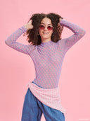 Pink printed long-sleeve bodysuit from Project Soma x Barbie collection with all-over monogram pattern and fitted silhouette for bold fashion looks — ροζ printed γυναικείο bodysuit Project Soma x Barbie με μοτίβο monogram και εφαρμοστή γραμμή για statement outfits. Διαθέσιμο στο Iconic Angels Glyfada.