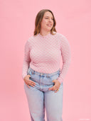 Pink monogram long-sleeve bodysuit from Project Soma x Barbie collection with fitted silhouette and all-over Barbie pattern for chic statement styling — ροζ monogram γυναικείο bodysuit Project Soma x Barbie με εφαρμοστή γραμμή και Barbie μοτίβο για fashion looks. Διαθέσιμο στο Iconic Angels Glyfada.