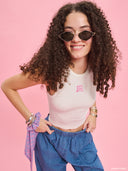 White ribbed sleeveless top from Project Soma x Barbie collection with pink embroidered logo and fitted silhouette for modern casual styling — λευκό ribbed γυναικείο αμάνικο top Project Soma x Barbie με ροζ κεντημένο logo και εφαρμοστή γραμμή για μοντέρνα casual looks. Διαθέσιμο στο Iconic Angels Glyfada.