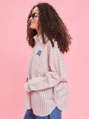 Striped oversized shirt from Project Soma x Barbie collection with pastel stripes and embroidered logo for playful contemporary styling — γυναικείο ριγέ oversized πουκάμισο από τη συλλογή Project Soma x Barbie με pastel ρίγες και κεντημένο logo για μοντέρνα playful looks. Διαθέσιμο στο Iconic Angels Glyfada.