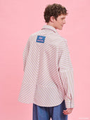 Striped oversized shirt from Project Soma x Barbie collection with pastel stripes and embroidered logo for playful contemporary styling — γυναικείο ριγέ oversized πουκάμισο από τη συλλογή Project Soma x Barbie με pastel ρίγες και κεντημένο logo για μοντέρνα playful looks. Διαθέσιμο στο Iconic Angels Glyfada.
