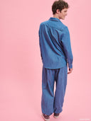 Blue denim balloon pants from Project Soma x Barbie collection with elastic waist and relaxed streetwear silhouette — γυναικείο denim παντελόνι balloon από τη συλλογή Project Soma x Barbie με λάστιχο στη μέση και χαλαρή streetwear γραμμή για statement casual looks. Διαθέσιμο στο Iconic Angels Glyfada.