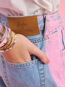 Light blue straight-leg jeans from Project Soma x Barbie collection with pink side stripe detail for modern sporty styling — γυναικείο τζιν Project Soma x Barbie σε ανοιχτό μπλε με ροζ πλαϊνή ρίγα και straight γραμμή για μοντέρνα casual looks. Διαθέσιμο στο Iconic Angels Glyfada.