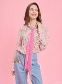 Pink terrazzo print oversized shirt from Project Soma x Barbie collection with statement tie scarf detail for playful fashion styling — γυναικείο oversized πουκάμισο Project Soma x Barbie με ροζ terrazzo print και statement γραβάτα για μοντέρνα playful looks. Διαθέσιμο στο Iconic Angels Glyfada.