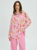 Project Soma floral shirt in pink and yellow tones with lightweight sheer fabric, featuring button-up front, relaxed fit and side tie details for feminine statement styling — γυναικείο Project Soma floral πουκάμισο σε ροζ και κίτρινες αποχρώσεις με ανάλαφρη διάφανη υφή, με κουμπιά και πλαϊνά δεσίματα για εντυπωσιακά θηλυκά looks.