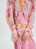 Project Soma floral shirt in pink and yellow tones with lightweight sheer fabric, featuring button-up front, relaxed fit and side tie details for feminine statement styling — γυναικείο Project Soma floral πουκάμισο σε ροζ και κίτρινες αποχρώσεις με ανάλαφρη διάφανη υφή, με κουμπιά και πλαϊνά δεσίματα για εντυπωσιακά θηλυκά looks.