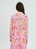 Project Soma floral shirt in pink and yellow tones with lightweight sheer fabric, featuring button-up front, relaxed fit and side tie details for feminine statement styling — γυναικείο Project Soma floral πουκάμισο σε ροζ και κίτρινες αποχρώσεις με ανάλαφρη διάφανη υφή, με κουμπιά και πλαϊνά δεσίματα για εντυπωσιακά θηλυκά looks.