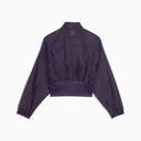Deep plum zip-up jacket with lightweight sheer panels and relaxed silhouette, featuring subtle Puma logo detail for a modern sporty look — μωβ γυναικείο jacket με φερμουάρ και ελαφριά διαφάνεια στα μανίκια, ιδανικό για athleisure, layering και chic sporty everyday looks. Διαθέσιμο στο Iconic Angels Glyfada.