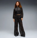 Black lightweight wide leg pants with semi-sheer fabric and elastic waistband, featuring subtle Puma logo detail for a modern sporty look — μαύρο γυναικείο παντελόνι σε wide leg γραμμή με ελαστική μέση και ελαφριά διαφάνεια, ιδανικό για athleisure, layering και chic sporty everyday looks. Διαθέσιμο στο Iconic Angels Glyfada.