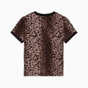 Puma women’s leopard print slim t-shirt with black ribbed trims and subtle logo detail, blending sporty edge with bold animal pattern — γυναικείο εφαρμοστό t-shirt Puma με leopard print μοτίβο, μαύρα rib τελειώματα και διακριτικό logo στο στήθος, ιδανικό για sporty-chic και statement casual looks. Διαθέσιμο στο Iconic Angels Glyfada.