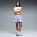 Lavender balloon mini skirt with elastic waistband and subtle Puma logo detail, combining playful volume with sporty aesthetics — λιλά φούστα balloon σε mini μήκος με ελαστική μέση και athletic χαρακτήρα, ιδανική για sporty chic και athleisure summer looks με statement διάθεση. Διαθέσιμη στο Iconic Angels Glyfada.