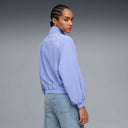 Lavender zip-up track jacket with high collar, elastic cuffs and subtle Puma logo detail, combining retro sport aesthetics with modern comfort — λιλά γυναικείο αθλητικό jacket με φερμουάρ, ψηλό γιακά και relaxed γραμμή, ιδανικό για sporty casual και athleisure looks με statement χαρακτήρα. Διαθέσιμο στο Iconic Angels Glyfada.