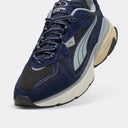 Navy and black sneakers with breathable mesh panels and sculpted cushioned sole, blending retro running aesthetics with modern comfort — navy Puma sneakers με mesh λεπτομέρειες και chunky αντικραδασμική σόλα σε μπλε και μαύρους τόνους, ιδανικά για δυναμικά everyday looks με sporty χαρακτήρα. Διαθέσιμα στο Iconic Angels Glyfada.