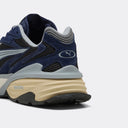 Navy and black sneakers with breathable mesh panels and sculpted cushioned sole, blending retro running aesthetics with modern comfort — navy Puma sneakers με mesh λεπτομέρειες και chunky αντικραδασμική σόλα σε μπλε και μαύρους τόνους, ιδανικά για δυναμικά everyday looks με sporty χαρακτήρα. Διαθέσιμα στο Iconic Angels Glyfada.
