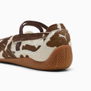 Cow print ballet flats with elastic strap and slim rubber sole, blending retro sport inspiration with playful statement style — animal print ballerinas με cow pattern σε καφέ και εκρού τόνους, με λεπτή σόλα και sporty αισθητική, ιδανικές για chic street και trend-forward everyday looks. Διαθέσιμες στο Iconic Angels Glyfada.