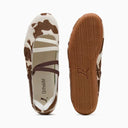 Cow print ballet flats with elastic strap and slim rubber sole, blending retro sport inspiration with playful statement style — animal print ballerinas με cow pattern σε καφέ και εκρού τόνους, με λεπτή σόλα και sporty αισθητική, ιδανικές για chic street και trend-forward everyday looks. Διαθέσιμες στο Iconic Angels Glyfada.