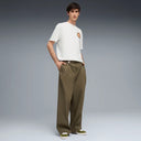 White graphic t-shirt with front logo detail and bold multicolor Puma artwork on the back, combining relaxed fit comfort with modern streetwear aesthetics — λευκό ανδρικό t-shirt με logo print μπροστά και statement πολύχρωμο graphic στην πλάτη, ιδανικό για street style και casual summer looks με urban χαρακτήρα. Διαθέσιμο στο Iconic Angels Glyfada.